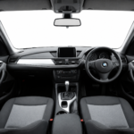 Interior dashboard and cabin of the 2010 BMW X1 sDrive18i right-hand drive